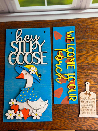 DIY goose porch post craft kit featuring a layered goose wearing a blue hat and jacket, Welcome to Our Porch insert sign, and Porch Rules hanging sign for interchangeable porch post decor.