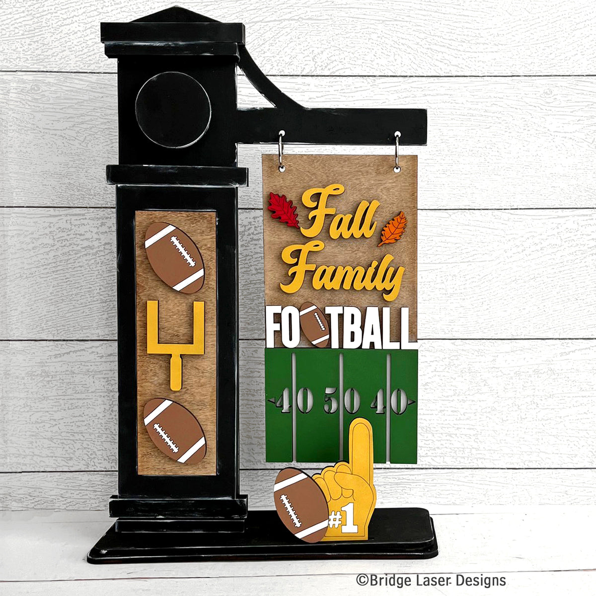 Completed football design displayed on the post