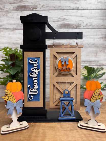 Finished interchangeable post with wood door retrofit kit and fall seasonal décor