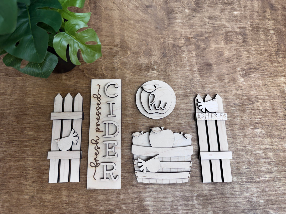 Unfinished apple orchard interchangeable décor kit with apple sign, basket and rustic fence pieces
