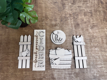 Unfinished apple orchard interchangeable décor kit with apple sign, basket and rustic fence pieces